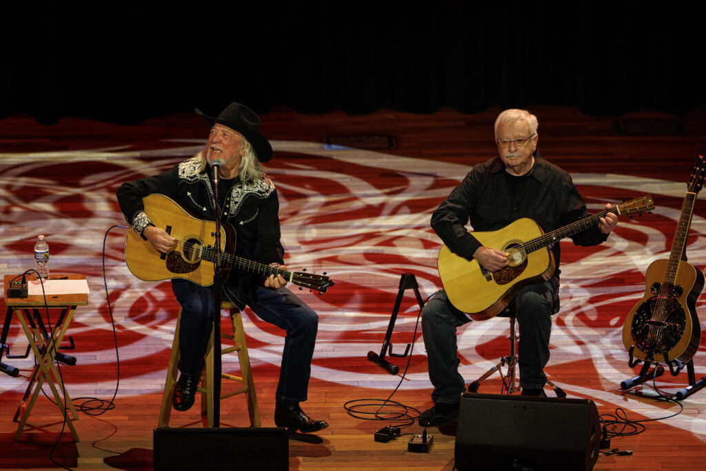 John Anderson and guitarist Dan Reeves on stage at the Ryman Auditorium February 6