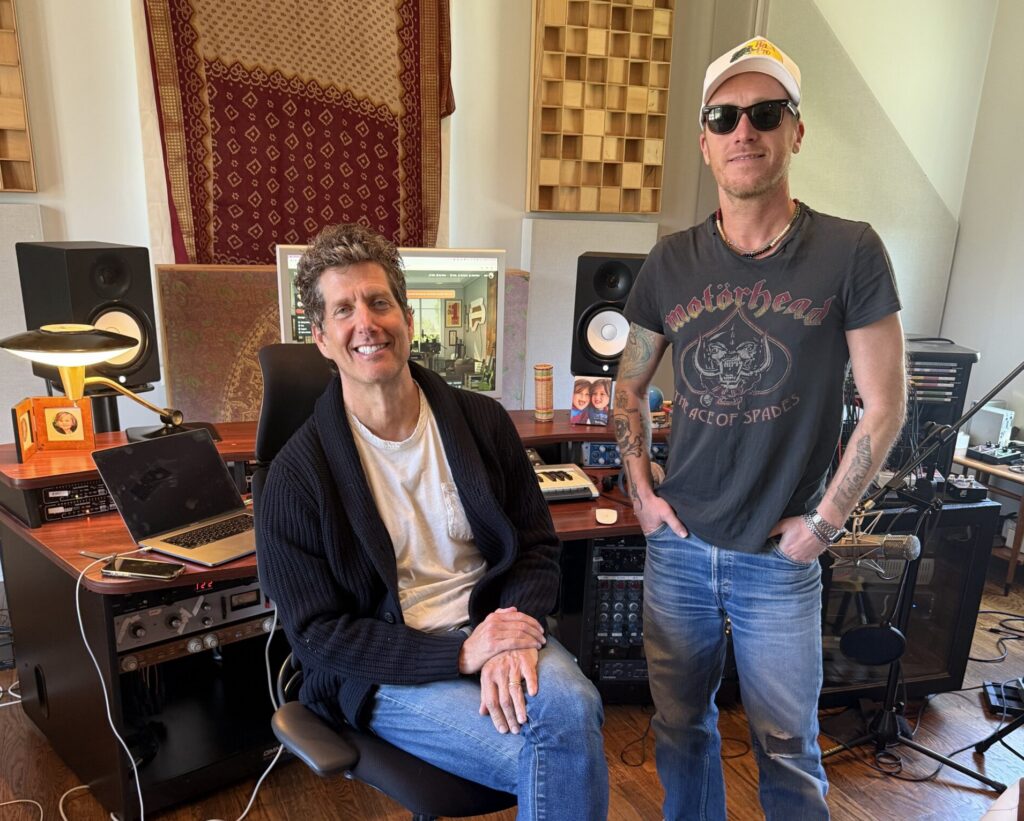 Kevin Griffin (seated) and Jaren Johnston in Griffin's home studio.